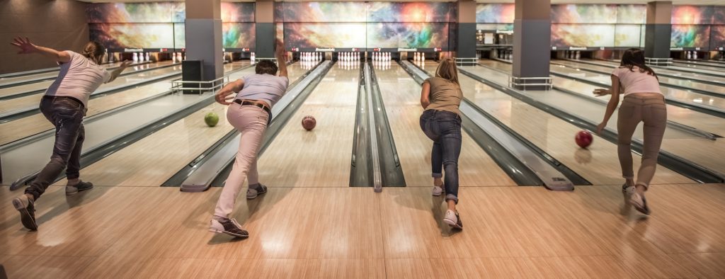 Friends playing bowling