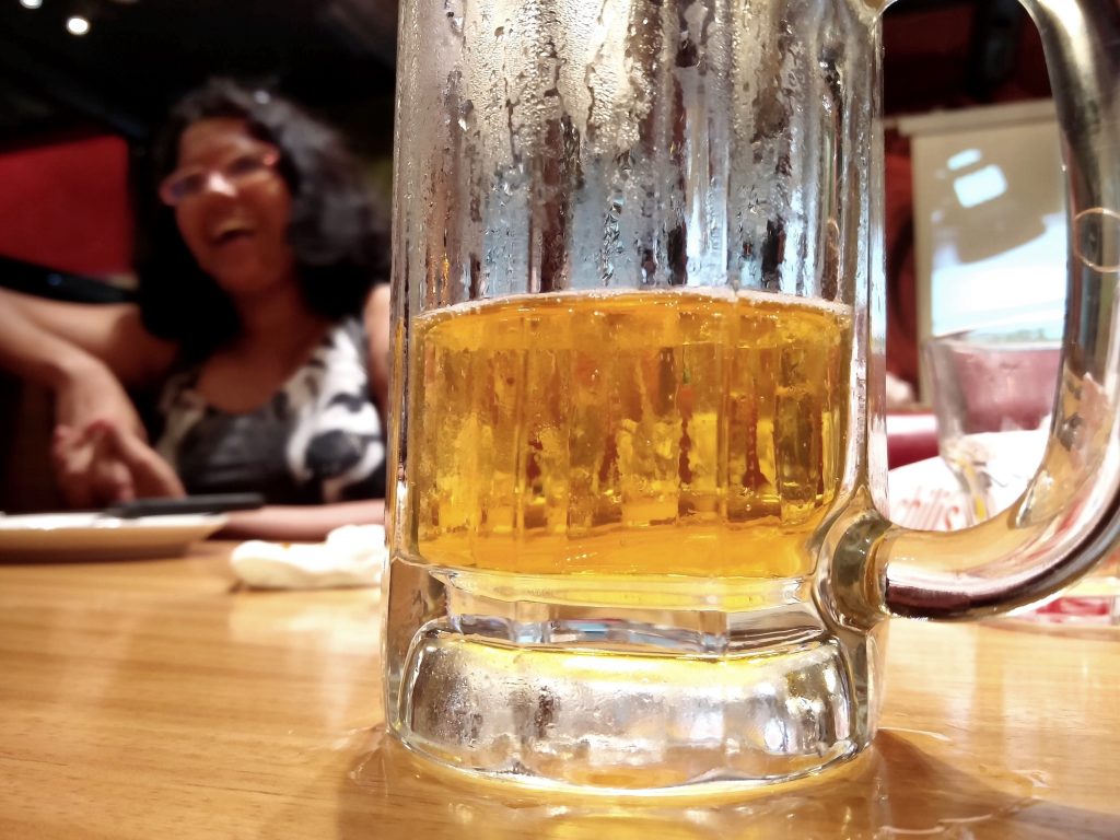 Enjoying beer at a restaurant with family